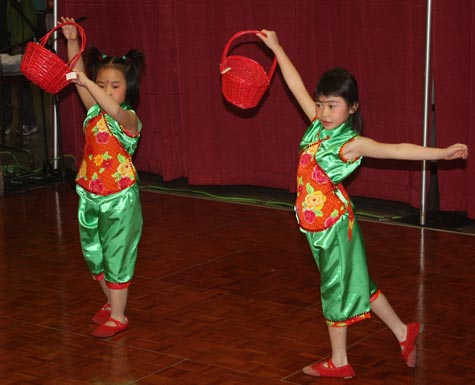 Chinese girls dance at Asia Plaza