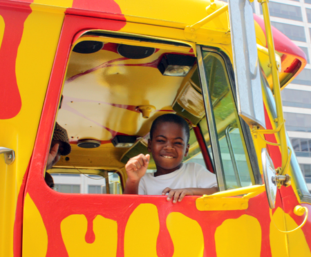 Boy in truck at parade