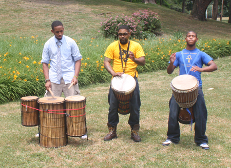 Raphael Ivy, Anthony Hubbard and Sean McKissick from the Golden Ciphers performed a drum call 