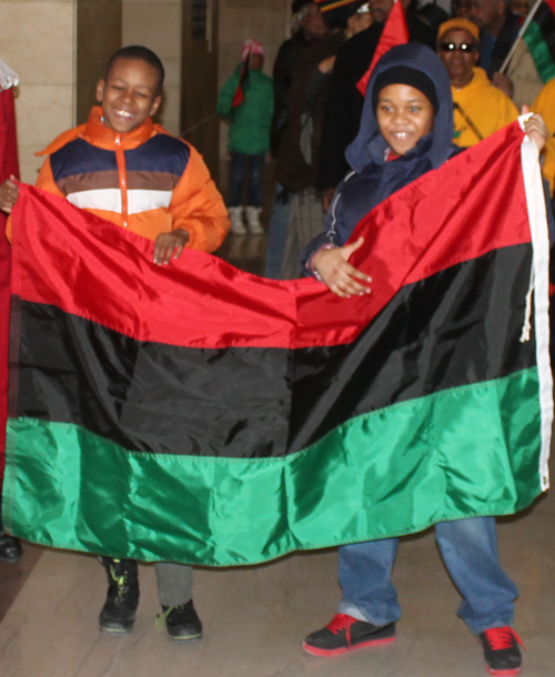Kids holding flag