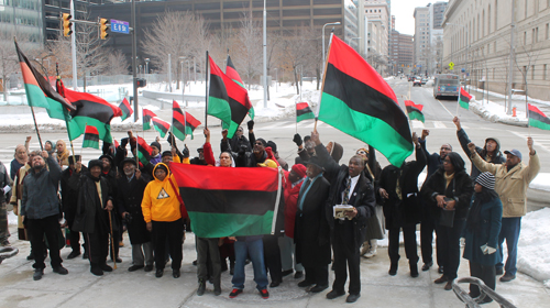 participants saluted the African-American flag that was flying over Cleveland City Hall