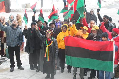 participants saluted the African-American flag that was flying over Cleveland City Hall