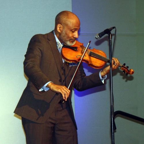 Obed Shelton playing violin