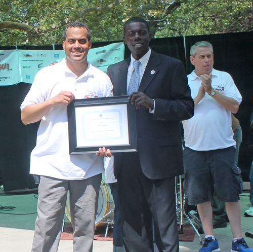 Councilmen Jeff Johnson with award