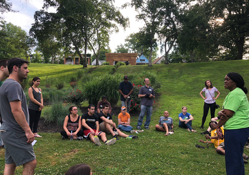 Jewish and African American volunteers work together in the African American Cultural Garden