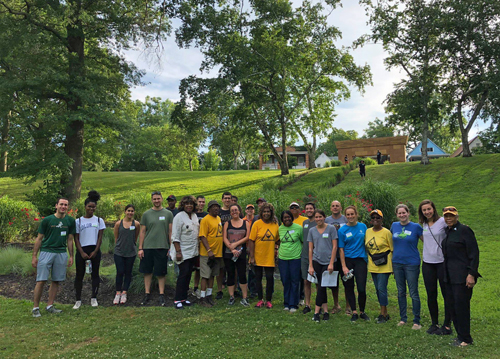 Jewish and African American volunteers work together in the African American Cultural Garden