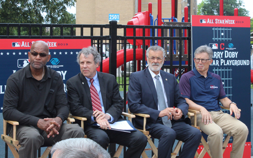 Larry Doby Jr., Senator Sherrod brown, Mayor Frank Jackson and Paul Dolan