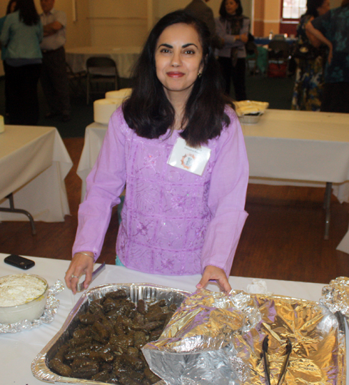 Sujata Burgess serving some of the delicious food