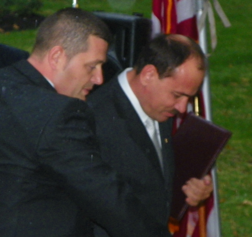 President Bujar Nishani of Albania arrives in the rain