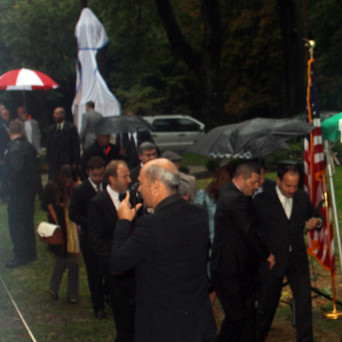 President Bujar Nishani of Albania arrives in the rain