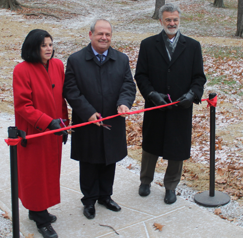 Dona Brady, Mayor Baftjar Zeqaj and Mayor Frank Jackson cut the ribbon