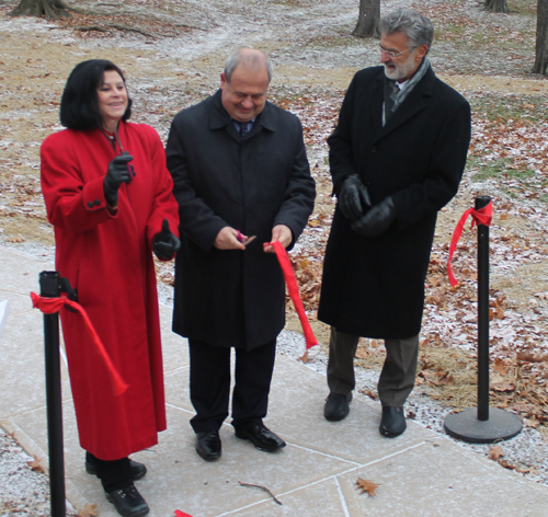 Dona Brady, Mayor Baftjar Zeqaj and Mayor Frank Jackson cut the ribbon