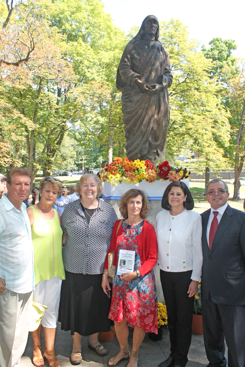 Posing with Mother Teresa Statue in Albanian Cultural Garden in Cleveland