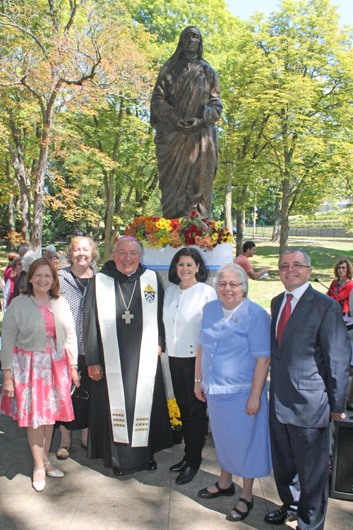 Sheila Crawford, Sister Ryan, Bishop Gries, Dona Bradt, Sister Karam and Adem Meta