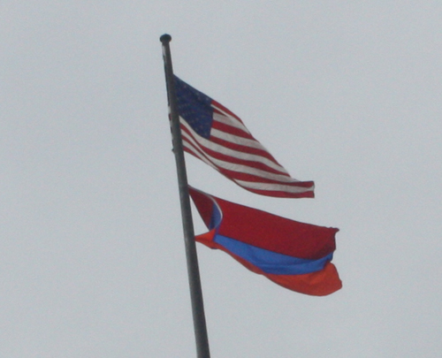 US and Armenian flag flying over Cleveland City Hall