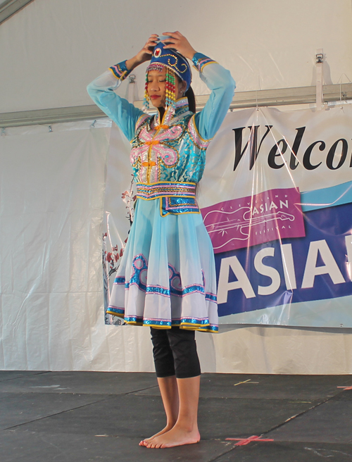 Models wearing the colorful fashions of Asia at the 2017 Cleveland Asian Festival