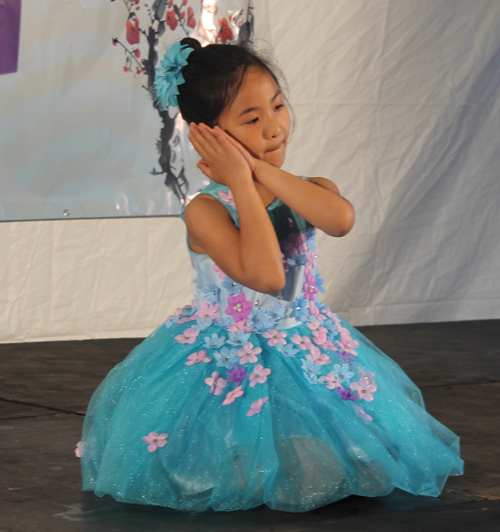 Very Young girl from the Great Wall Enrichment Center perform a traditional Chinese dance