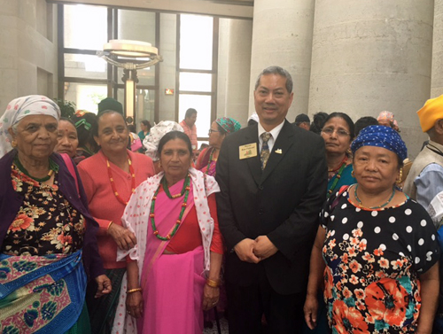 Bhutanese refugees with Mayor Ron Falconi