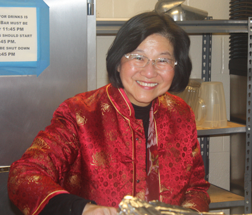 Cecilia Wong serving food