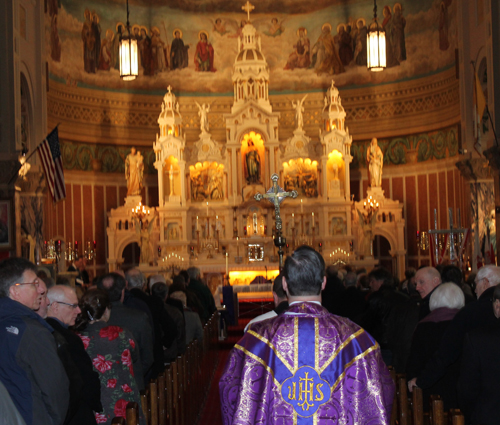 Fr. Orzech  processes into the Church