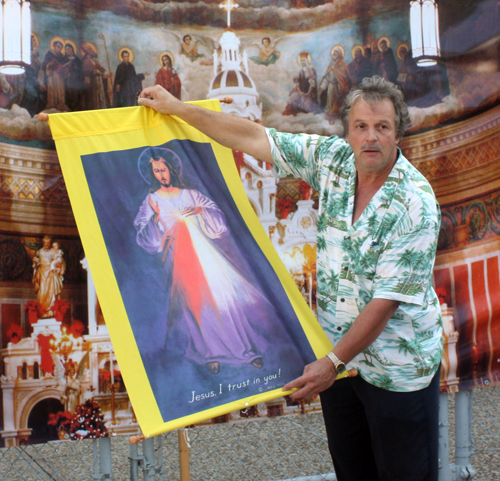 Joe Feckanin with Divine Mercy banner