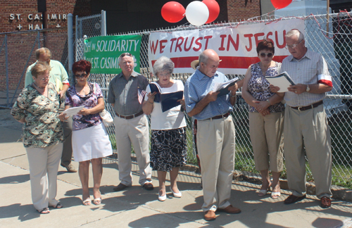 Crowd singing at St Casimir Church in Cleveland