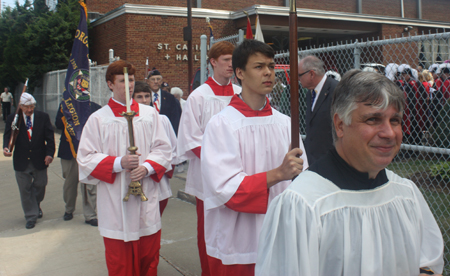 Procession into St Casimir Catholic Church in Cleveland as it reopened