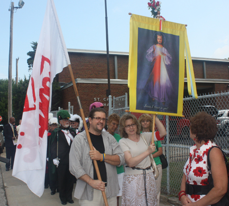 Procession into St Casimir Catholic Church in Cleveland as it reopened