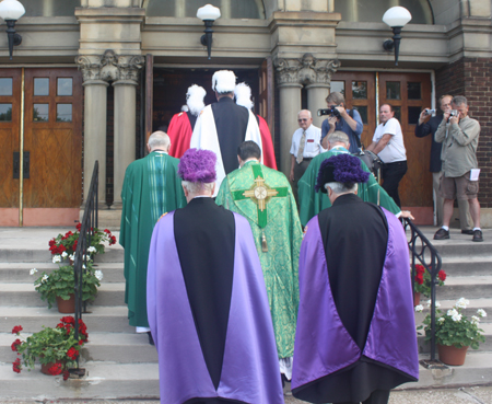Procession into St Casimir Catholic Church in Cleveland as it reopened