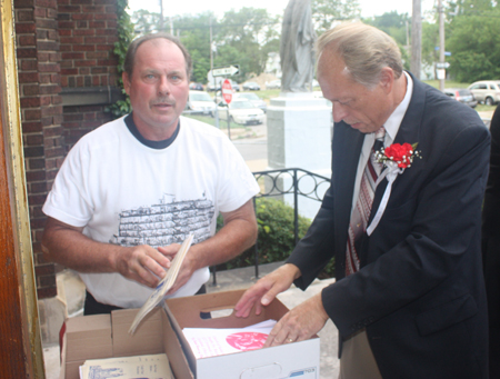 Rich handing out bulletins with John Niedzialek