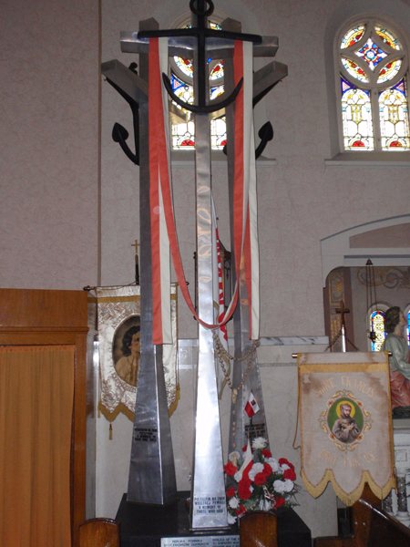 Replica of monument in Gdansk Poland where Solidarity began Inside of St Casimir Church in Cleveland