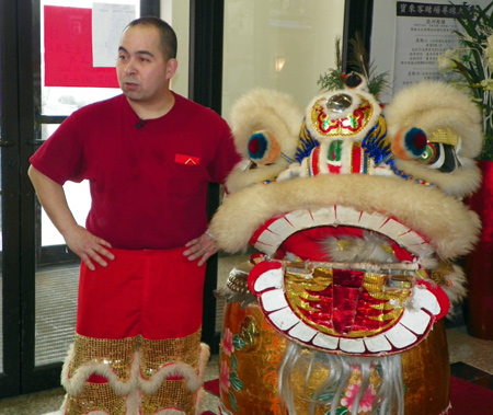 George Kwan prepares for a Lion Dance