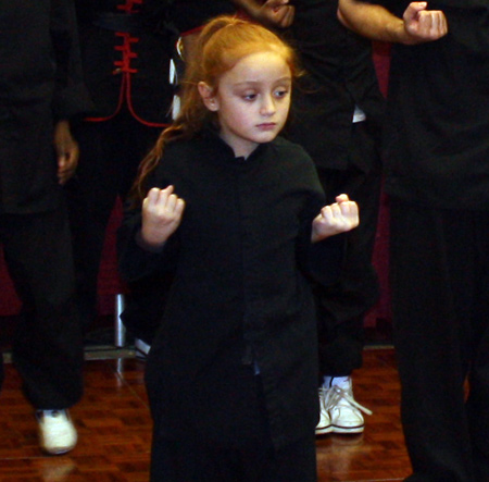 Young girl doing Chinese Shaolin Kungfu