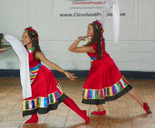 Dance from Tibet featuring a costume with one long sleeve