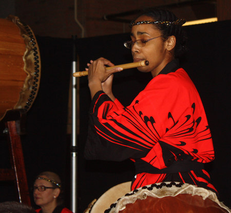 Flutist with Taiko Drumming by Icho Daiko featuring Oberlin Taiko 