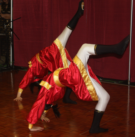 Young Chinese girls from Connie Zhang Acrobatic School perform an acrobatic dance