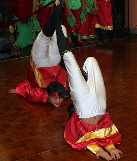 Young Chinese girls from Connie Zhang Acrobatic School perform an acrobatic dance