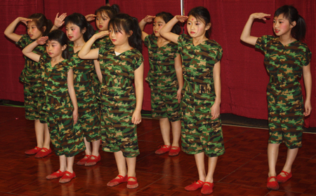 Young girls from Cleveland Contemporary Chinese Culture Association performed a Soldier dance at a Chinese New Year celebration at Asia Plaza in Cleveland