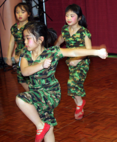 Young girls from Cleveland Contemporary Chinese Culture Association performed a Soldier dance at a Chinese New Year celebration at Asia Plaza in Cleveland