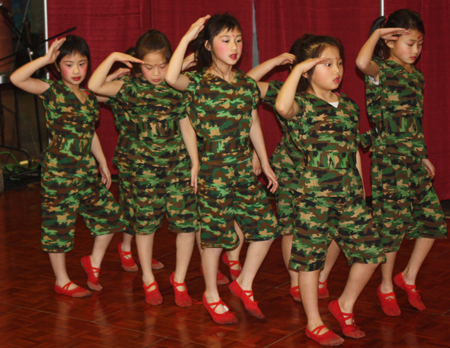 Young girls from Cleveland Contemporary Chinese Culture Association performed a Soldier dance at a Chinese New Year celebration at Asia Plaza in Cleveland