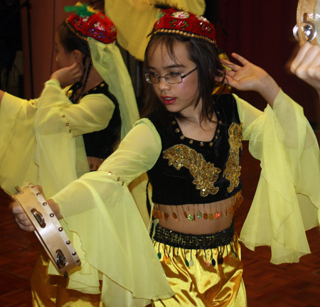 Chinese girls perform tanbourine dance