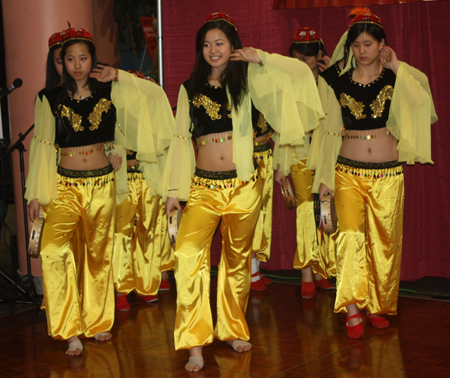 Chinese girls perform tanbourine dance