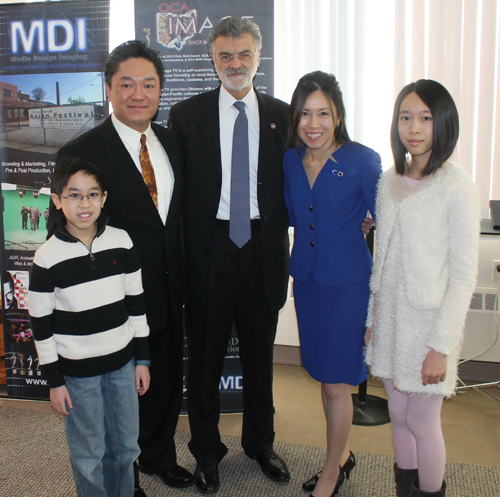 Wayne and Lisa Wong family with Mayor Frank Jackson