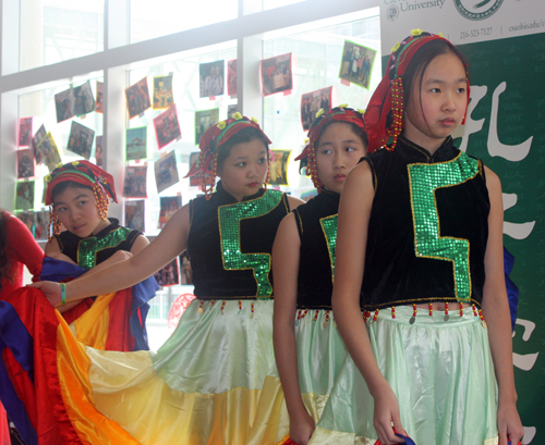 Young ladies in colorful rainbow costumes performed this traditional Chinese Dance