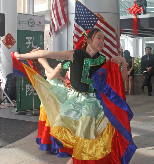 Young ladies in colorful rainbow costumes performed this traditional Chinese Dance