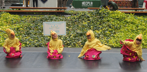 young girls and boys from the Cleveland Contemporary Chinese Culture Association (CCCCA) danced dressed as chickens