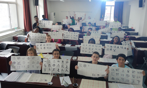 Showing their calligraphy skills