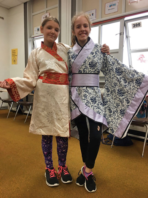 Two little beauties in adorable Han clothing
