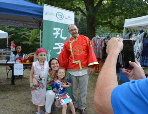 Trying on and taking pictures with Chinese traditional clothing