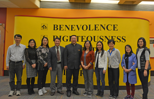 Mr. Aiguo Zhang and Confucius Institute Associate Director Prof. Xuhong Zhang, along with other CI teachers